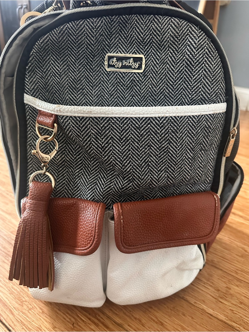 Itzy Ritzy Black & White Herringbone Backpack with Brown Trim